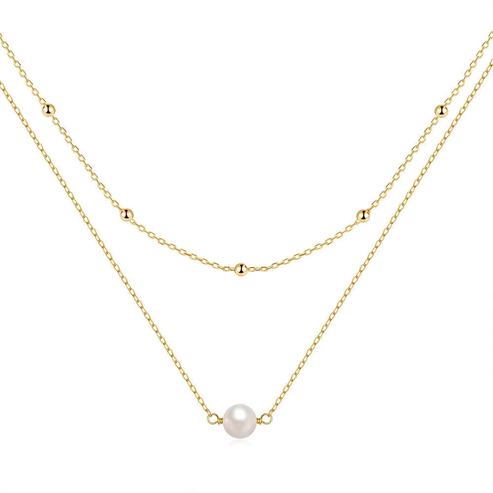 S925 sterling silver double layer necklace with twin pearls on a ball bead chain in gold colour.