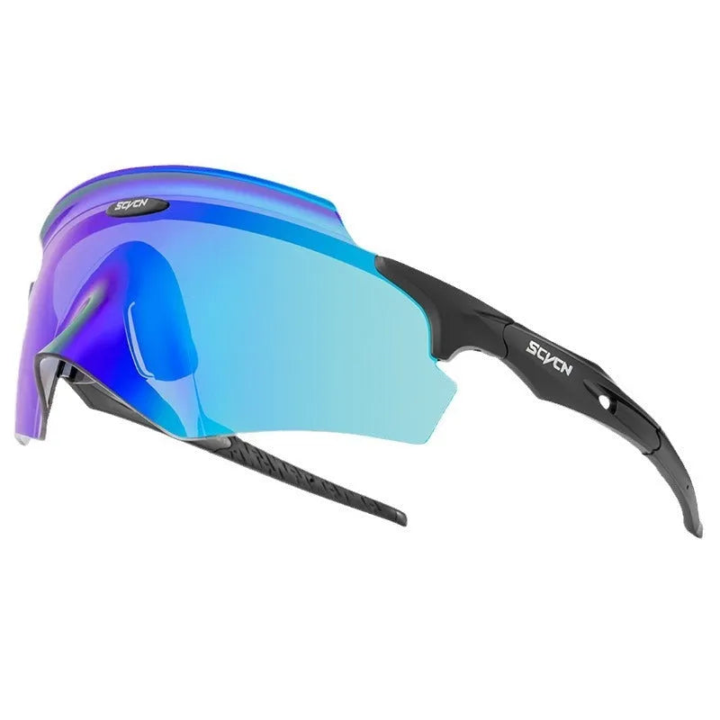 Frameless windproof sports goggles with a colourful integrated lens on a neutral background.