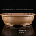 Large handmade purple sand tea basin in traditional style for plant cultivation