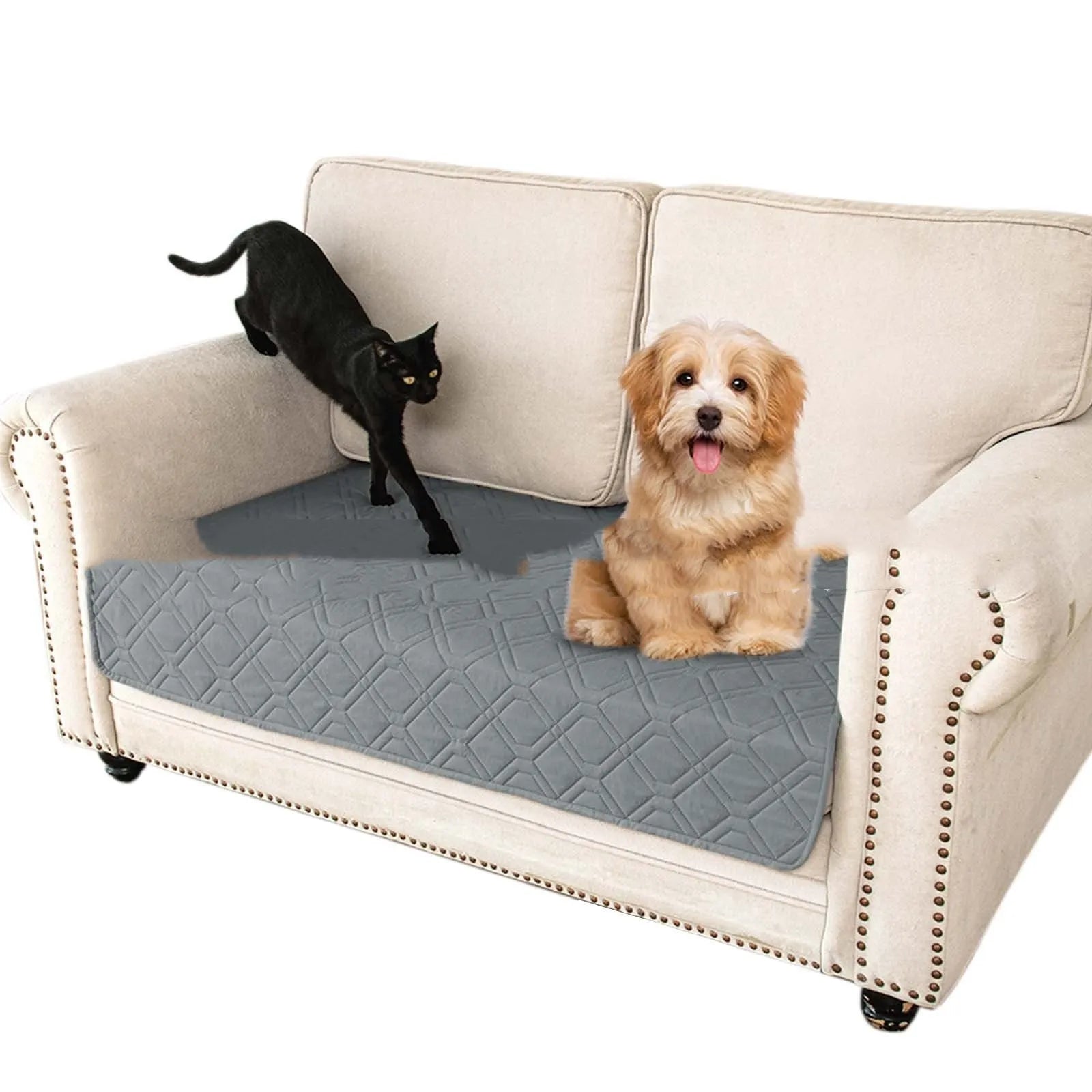 Reversible waterproof dog sofa cushion in dark grey and light grey contrast colours on a sofa.