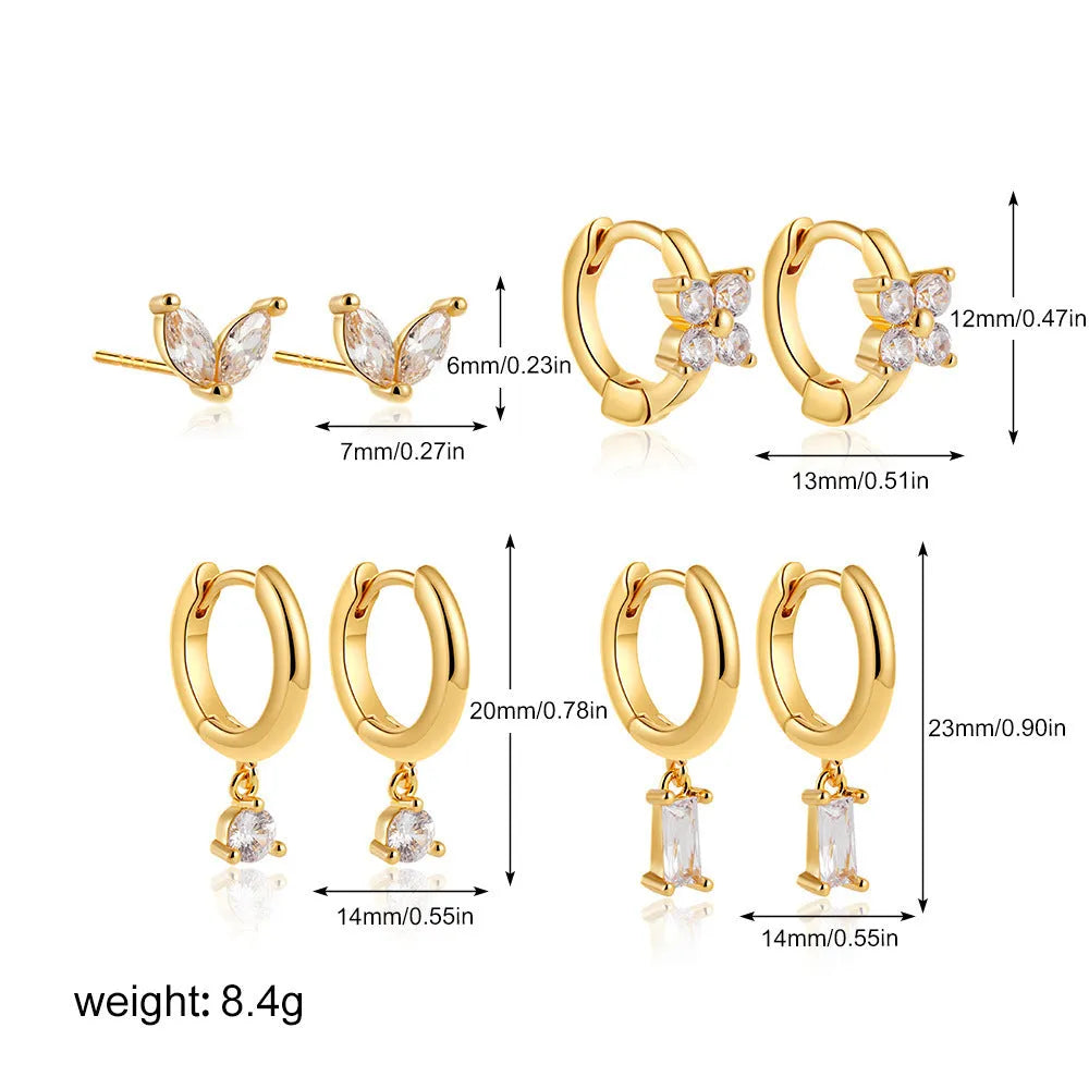 Copper geometric square earrings with electroplated gold or silver finish showing star and quadrilateral design elements