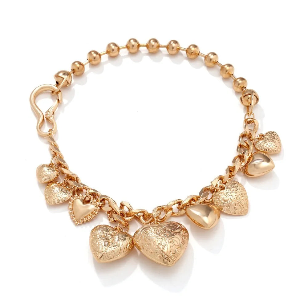 Exaggerated heart pendant necklace with dripping oil treatment in gold colour