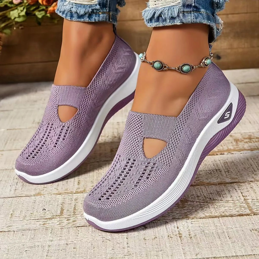 Women's low-top mesh casual shoes with a T-strap, flat heel, and round toe in various colours.