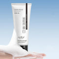 100ml bottle of white whitening and freckle removing facial cleanser for pore cleansing.