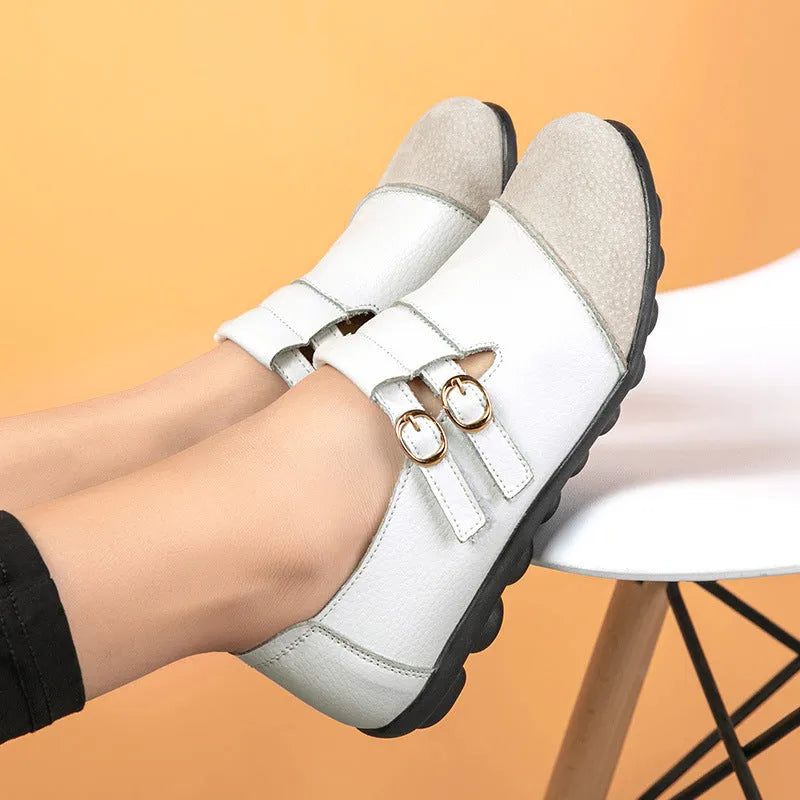 Women's plus size casual flat shoes with Velcro strap and round toe in multiple colours.