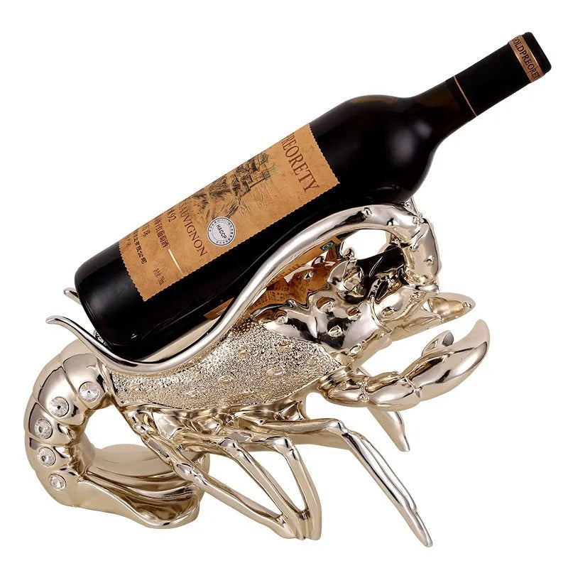 Lobster-shaped wine rack ornament in metallic rose gold or silver finish displaying wine bottle