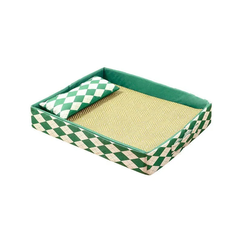 Blue woven rattan cat cooling mat with non-slip base placed on a wooden floor.