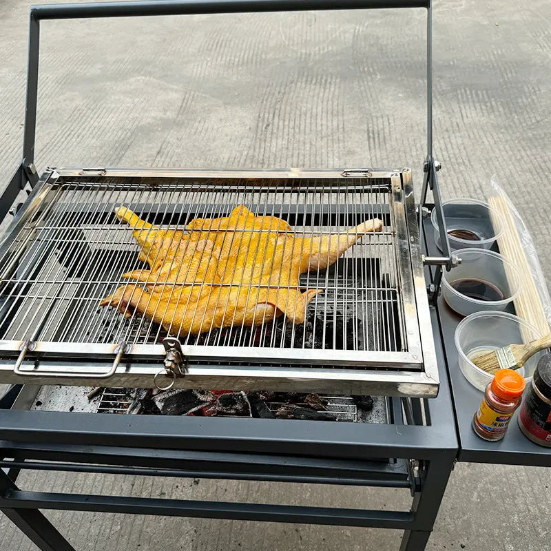 Portable foldable charcoal barbecue grill with detachable legs for outdoor cooking