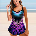 Female colourful printing loose belly-covering plus size swimsuit in green on model