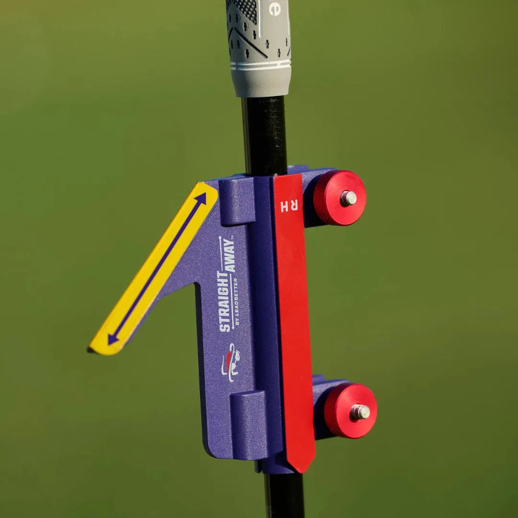 Plastic golf swing plane training simulator on practice surface
