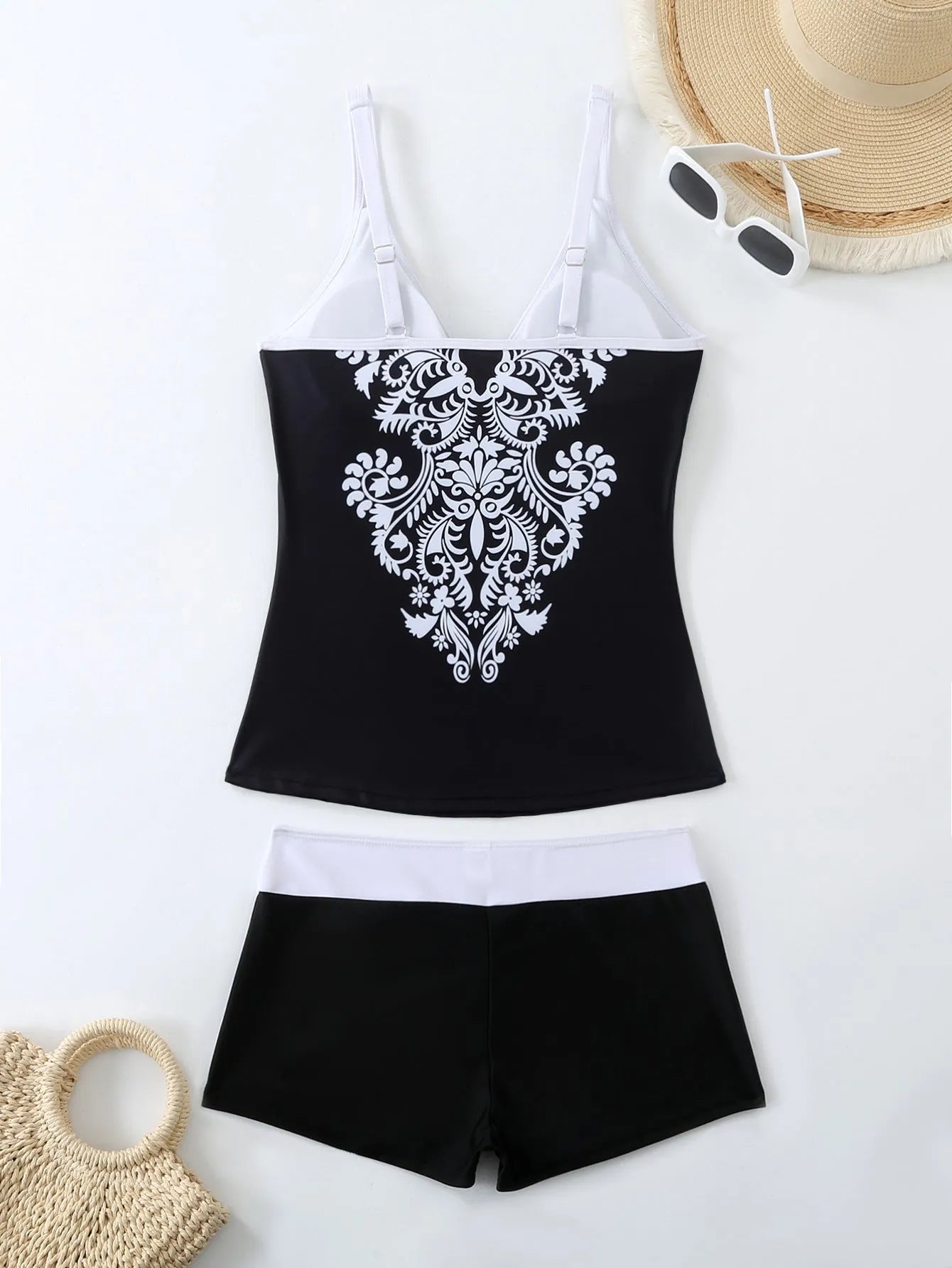 Plus size women's two-piece swimsuit set in black or rose red, showing top and briefs-style bottoms.