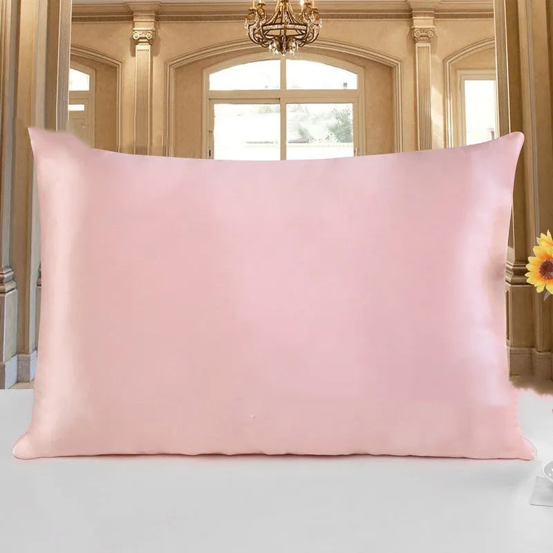 19 M double-sided silk pillowcase in apricot colour, showing envelope closure and smooth fabric texture.