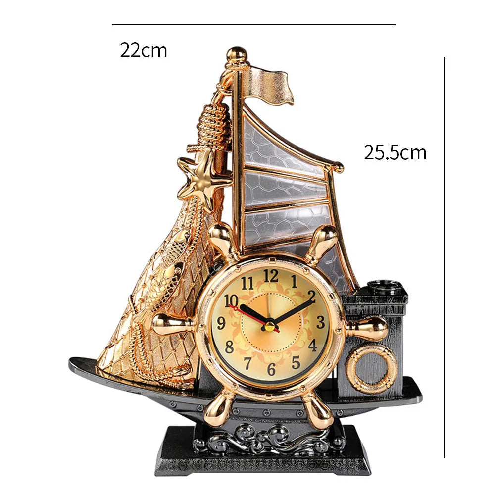 Fashion bedroom alarm clock in choice of gold or silver metallic finish on a surface.