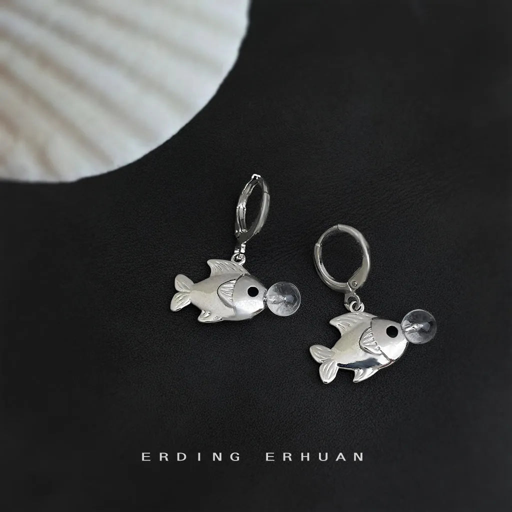 A pair of Bubble Fish design goldfish earrings made from copper with an electroplated finish.