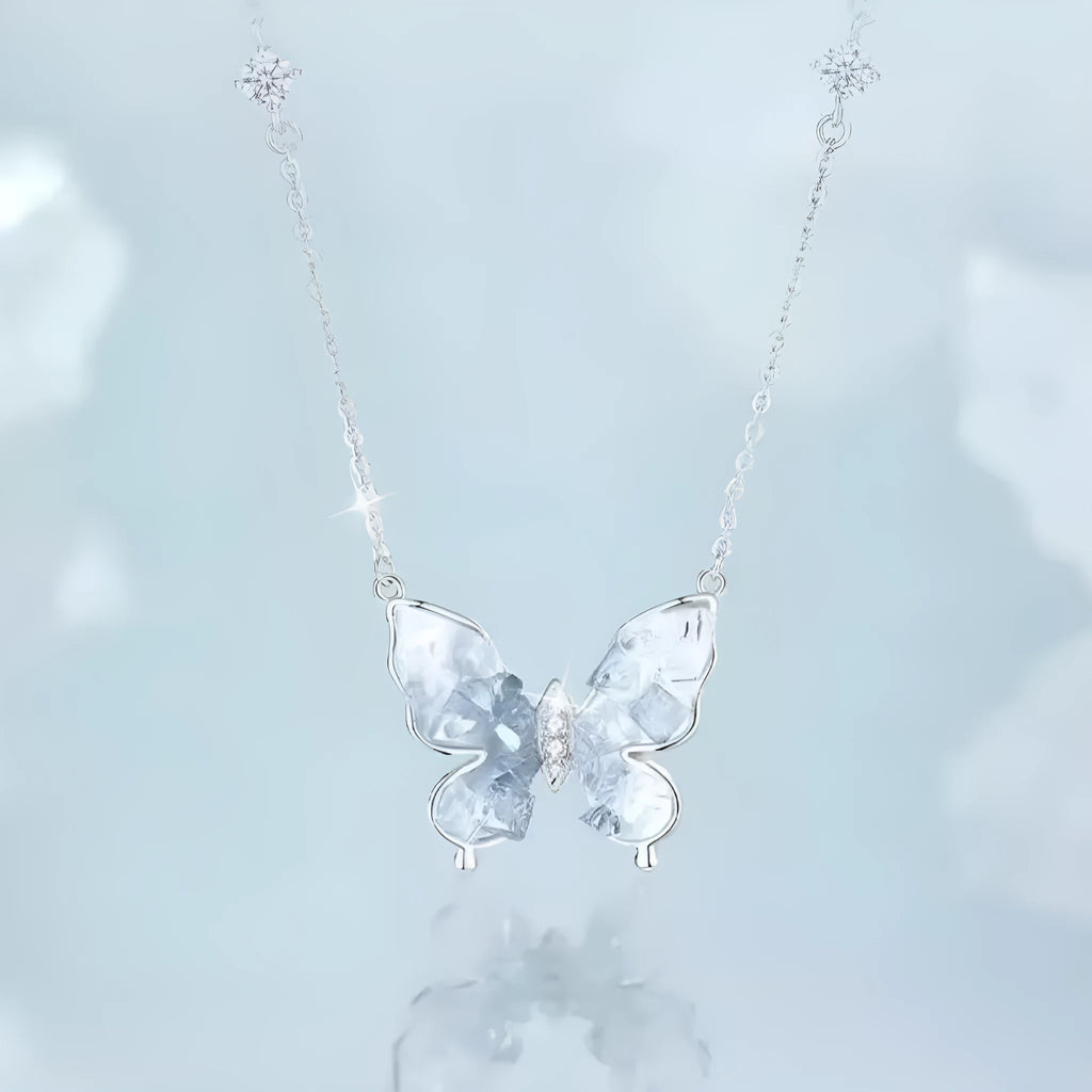 Silver butterfly necklace with adjustable chain showing pendant detail and O-ring links