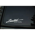 Reflective British style bumper sticker on plastic sheet, showing black, white, and colourful design options.