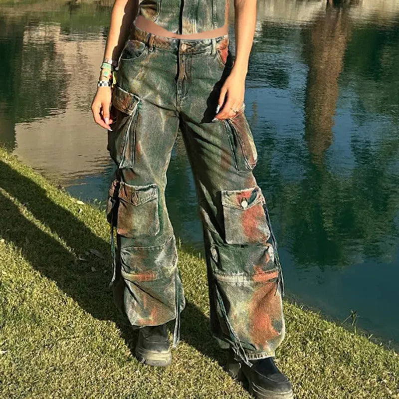 Loose cargo denim trousers with gradient colour pockets and multiple utility compartments
