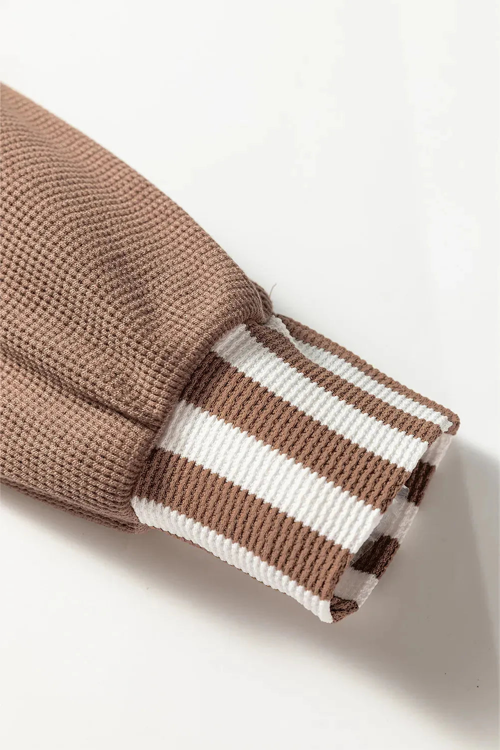 Straw yellow waffle texture hoodie with striped patchwork, button neck, and drawstring hood.