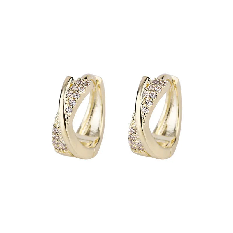 Geometric 14K yellow gold-plated earrings with zircon detailing on white background