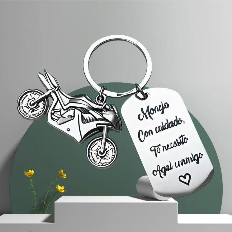 Stainless steel motorcycle keychain with engraving in a flannel bag