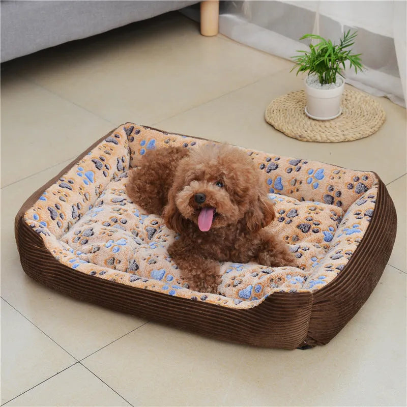 Beige plush pet dog bed with raised sides, shown next to a small dog.