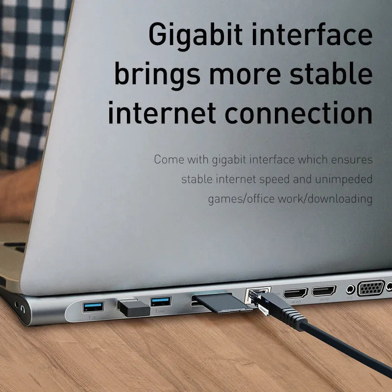 Grey aluminium 10-port docking station with cooling bracket showing HDMI, VGA, USB and Ethernet ports