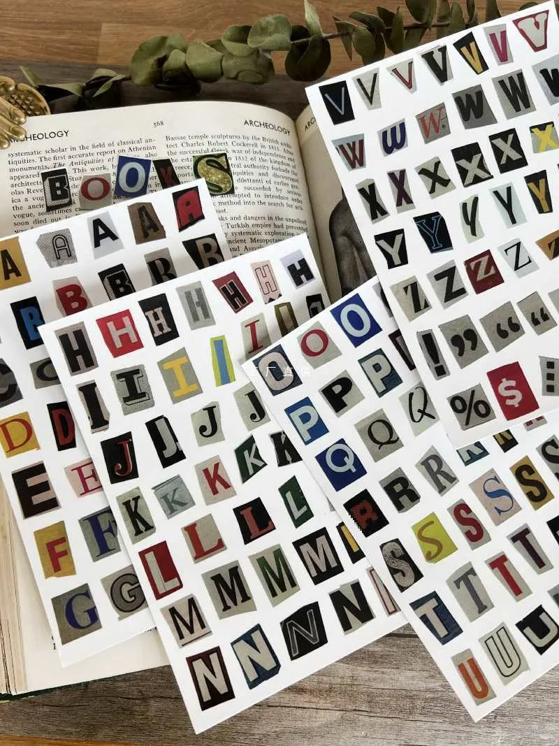 Set of cute style printed stickers showing English letters A, B, C, D, E and weekly words on a sheet.