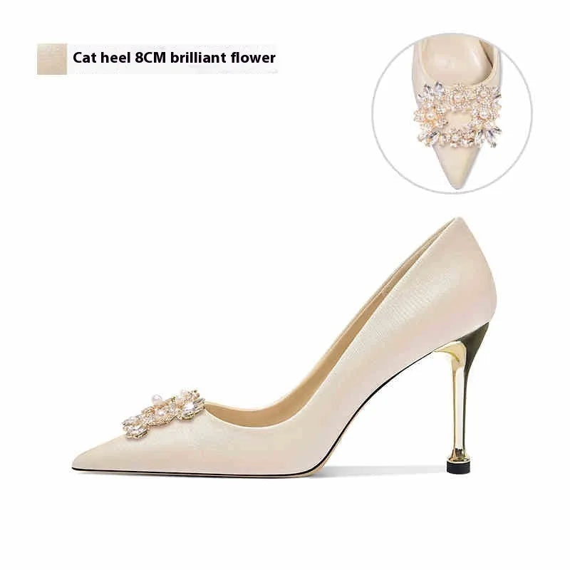 Women's white crystal bridal high heel pumps with rhinestone details and pointed toe