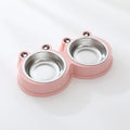Blue stainless steel double pet bowl with frog design, showing separate food and water compartments on a non-slip base.
