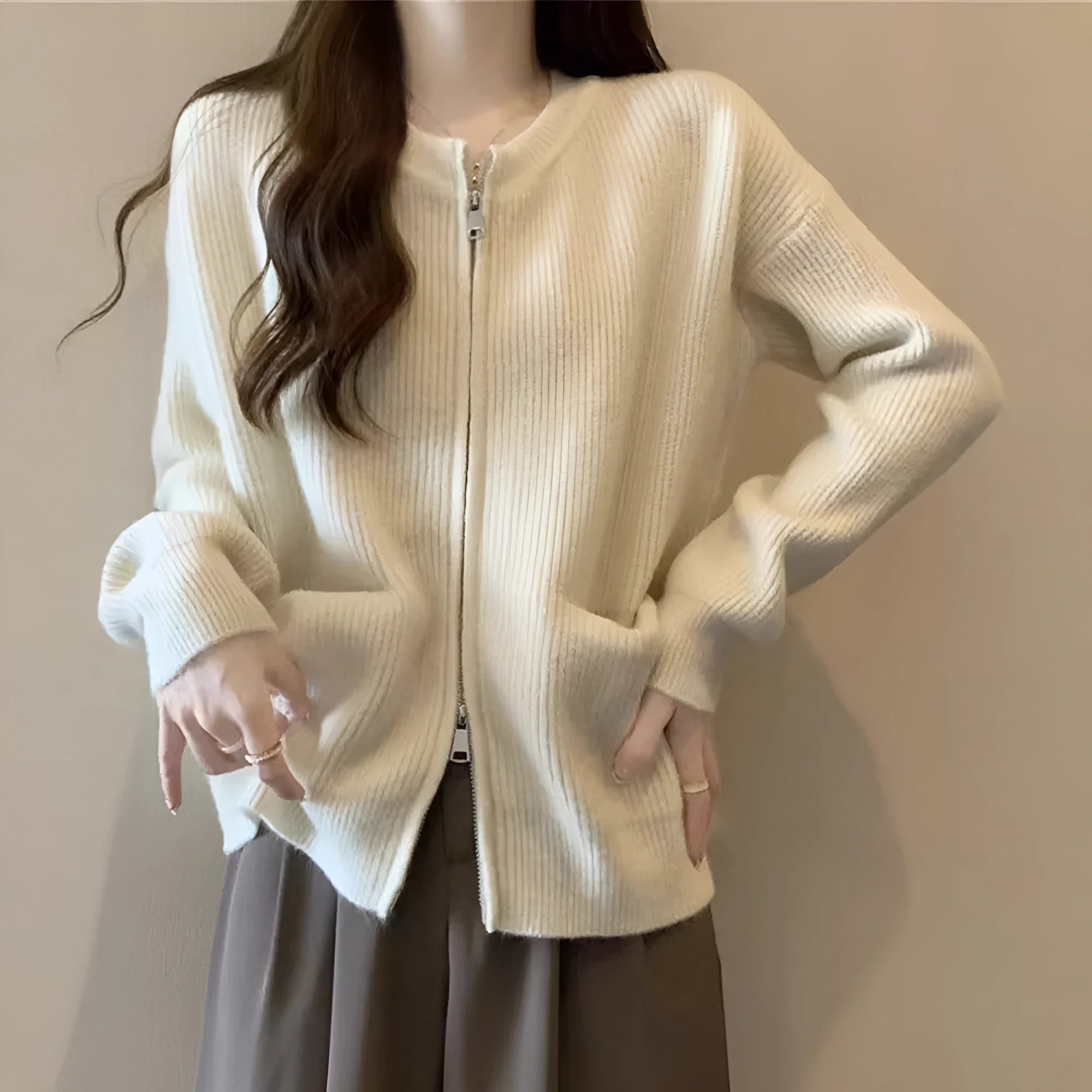Beige soft wind glutinous sweater coat cardigan with long sleeves on hanger