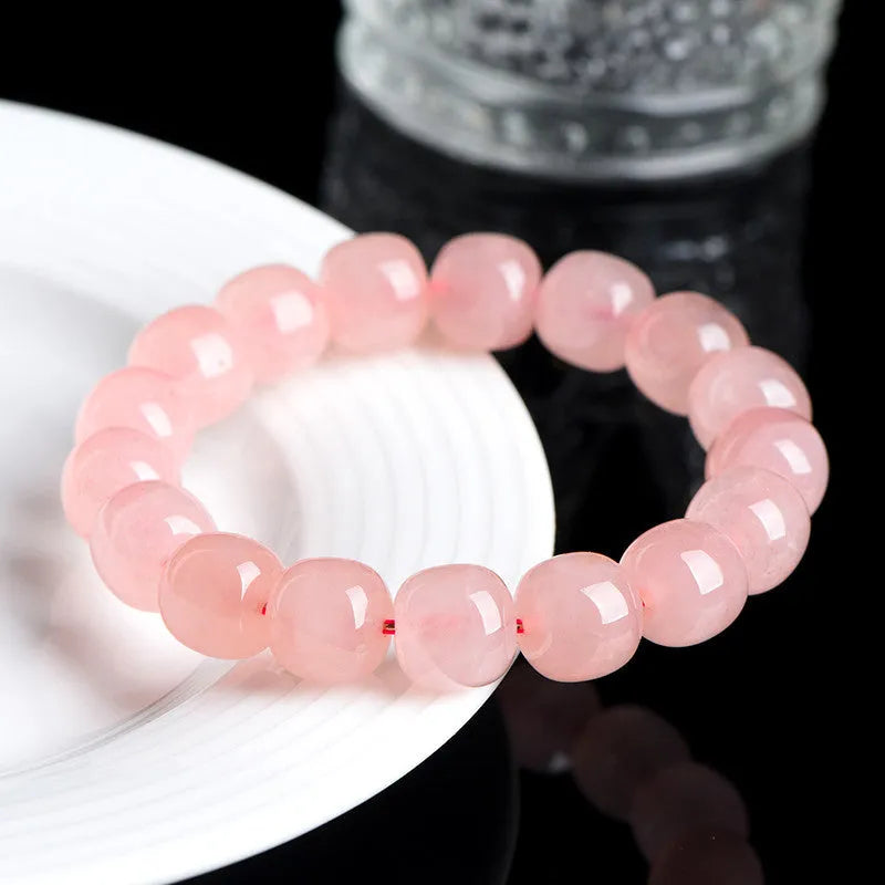 Pink natural crystal barrel bead bracelet with 8-10mm polished beads