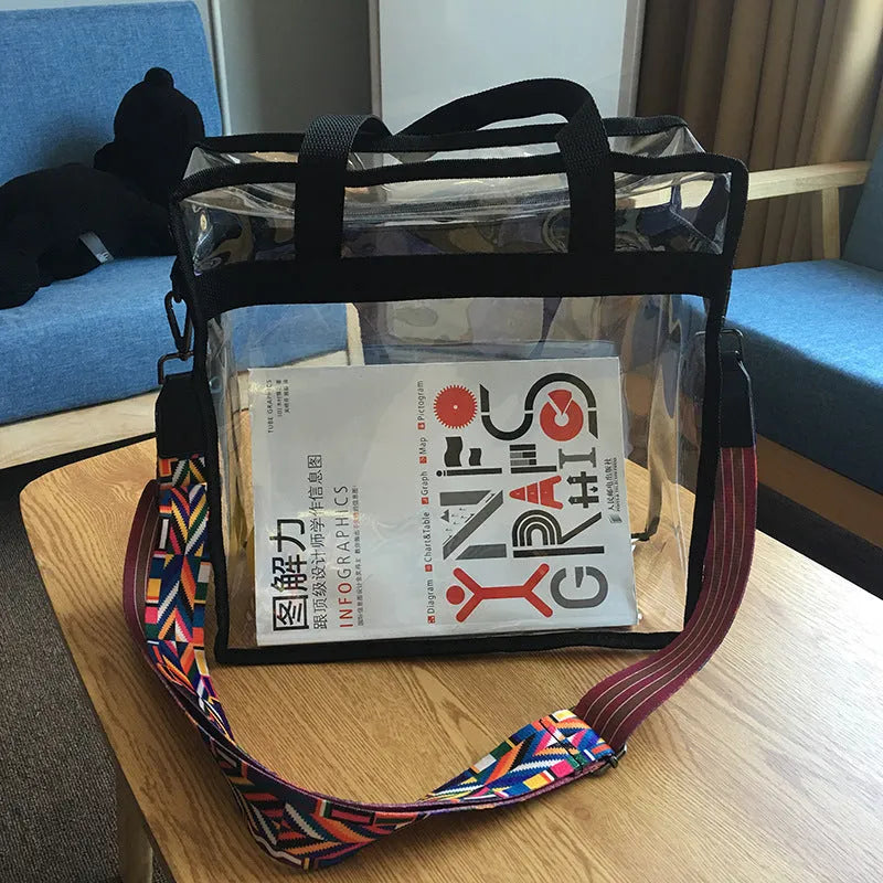 Transparent clear PVC women's messenger bag with double shoulder straps, shown in a brown front bag colour variant.