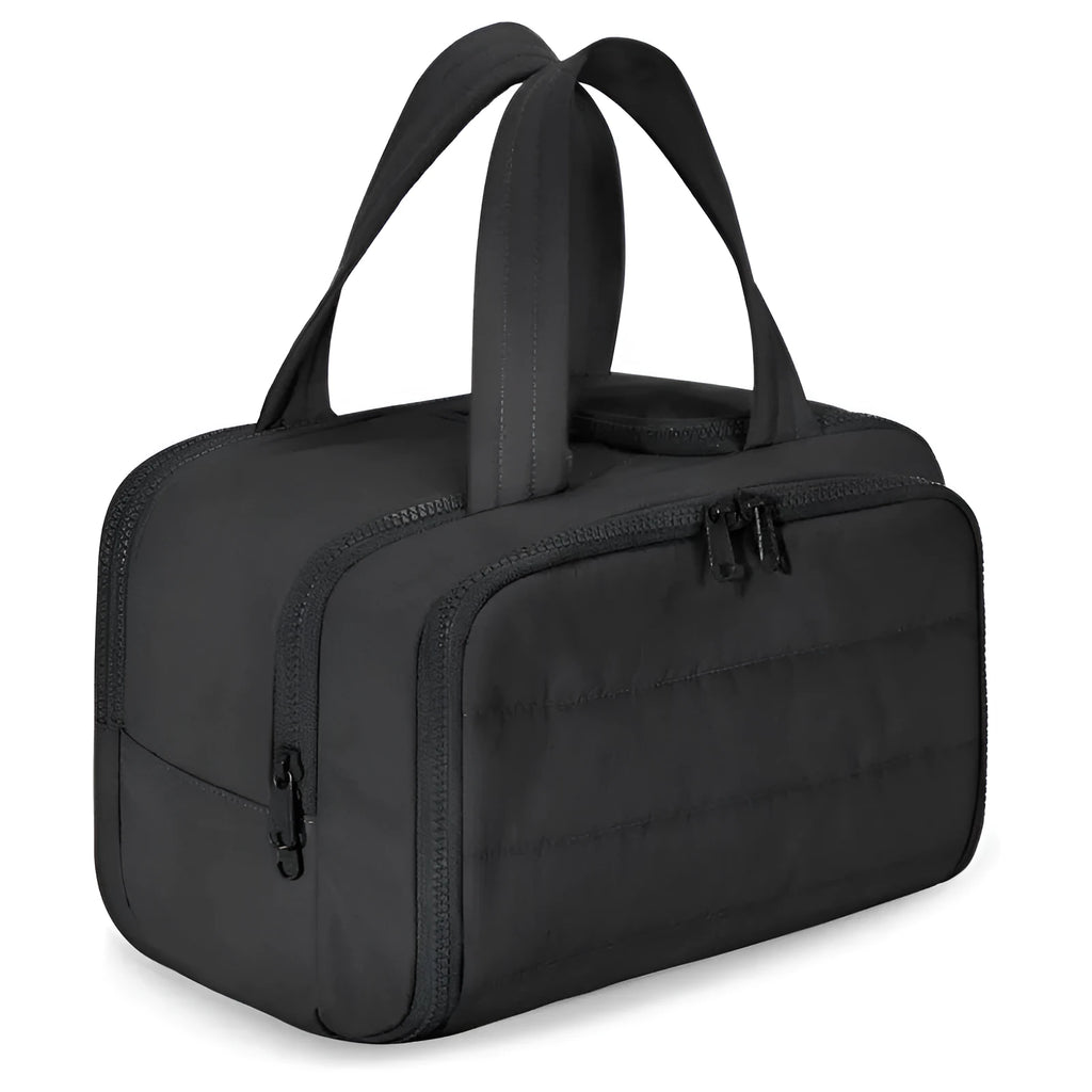 Large travel toiletry bag with wide open top showing interior capacity