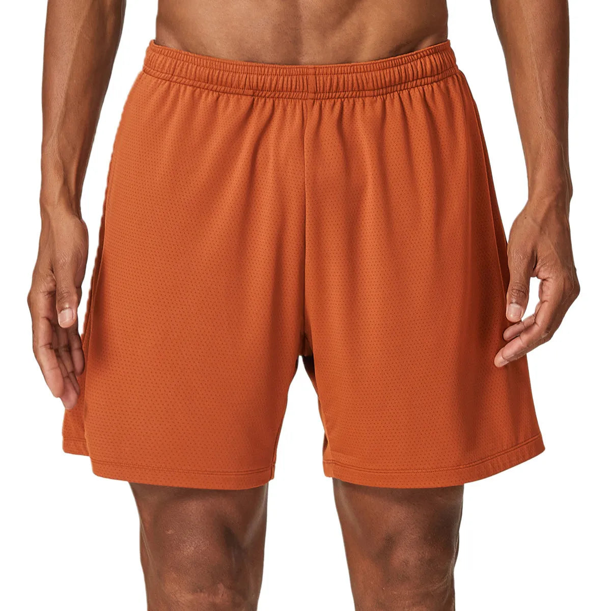 Man wearing sky blue double-layer quick-dry running shorts with a mid-waist fit.