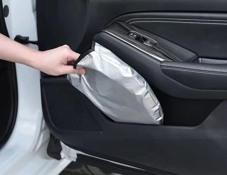 Titanium silver aluminium foil car sunshade for windshield heat and UV protection.