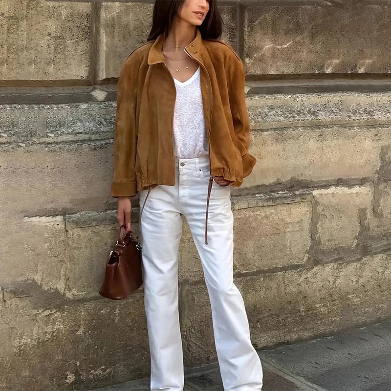 Loose fit solid colour retro jacket with long sleeves on mannequin