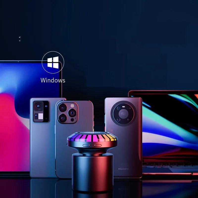 Small cube-shaped LED atmosphere lamp projecting polar light patterns with Bluetooth speaker functionality