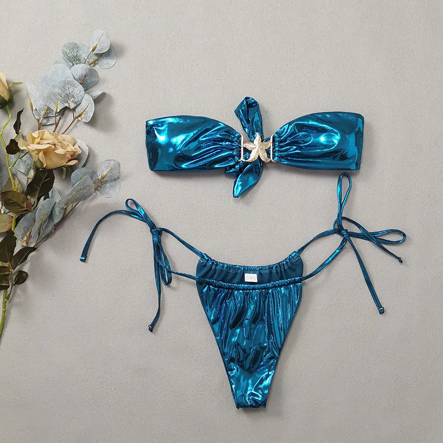 Glossy sapphire blue tube top bikini set with long sleeves, gold starfish, and briefs bottom.
