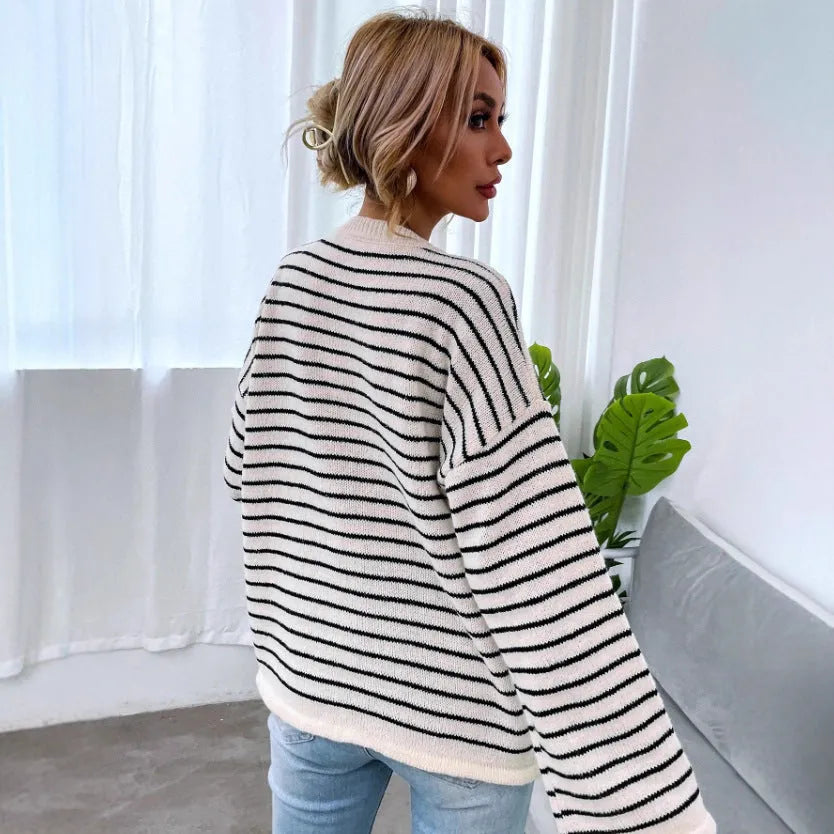 Women's black striped loose top with drop-shoulder sleeves and button details