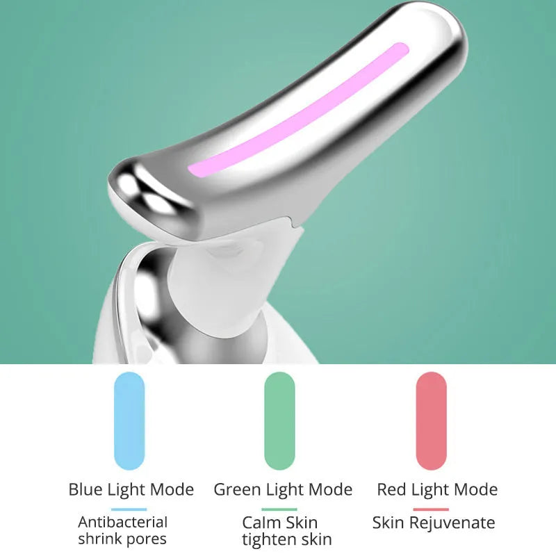 White EMS thermal neck massager device with LED lights on a stand next to USB cable and moisturiser.