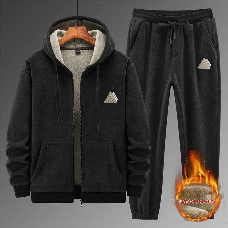 Grey men's cashmere hooded sweater and matching cotton trousers casual sports suit set on a hanger.