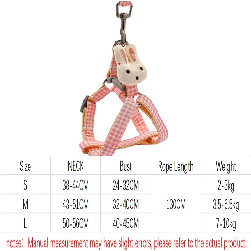 Blue nylon dog harness and leash set with quick-release buckle on a small dog.