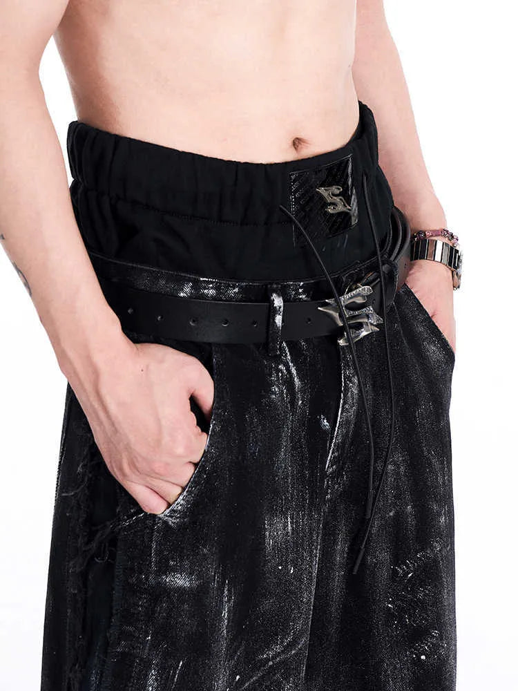 Black two-layer cowhide leather belt with metal letter buckle showing 110 cm length measurement