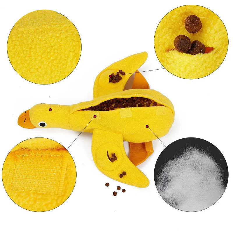 Yellow duck plush dog toy with a barking sound module for treat-dispensing play