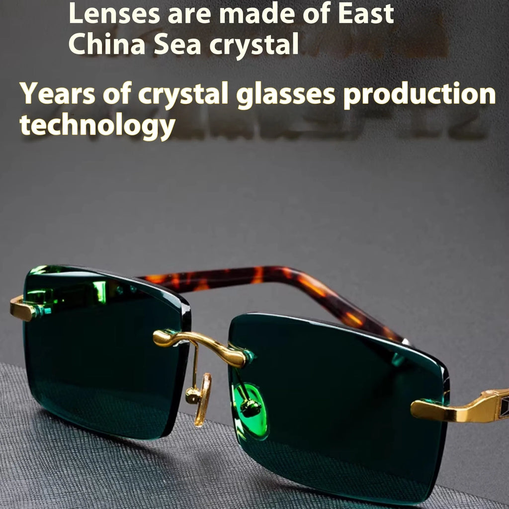 Pair of dark green frameless crystal sunshade glasses with case and cleaning cloth