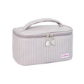 Open-top rectangular makeup bag in pastel PU leather showing quick-access design