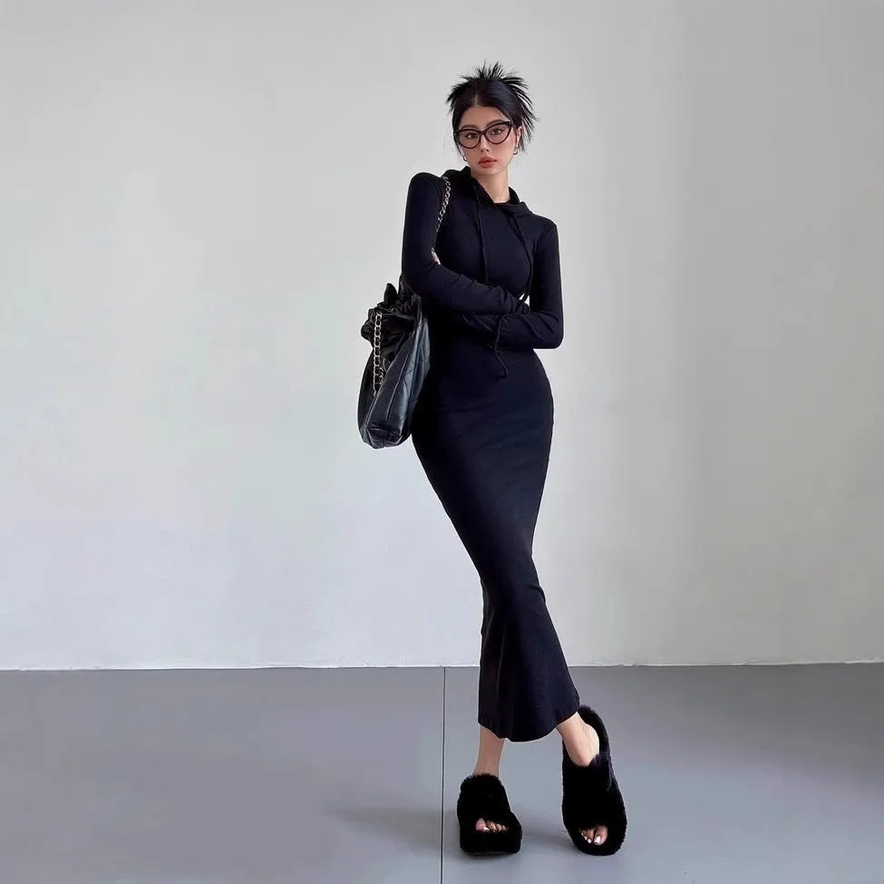 Women's light grey hooded long sleeve sheath dress with high waist on a model