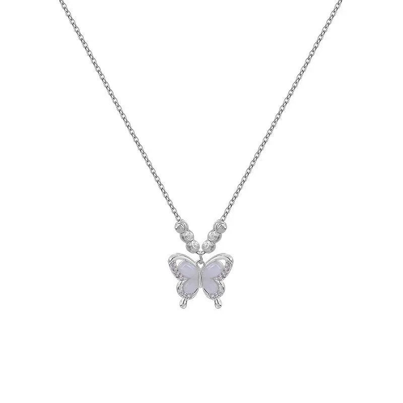 Women's silver butterfly necklace on a cross chain, made from 925 sterling silver with an adjustable length.