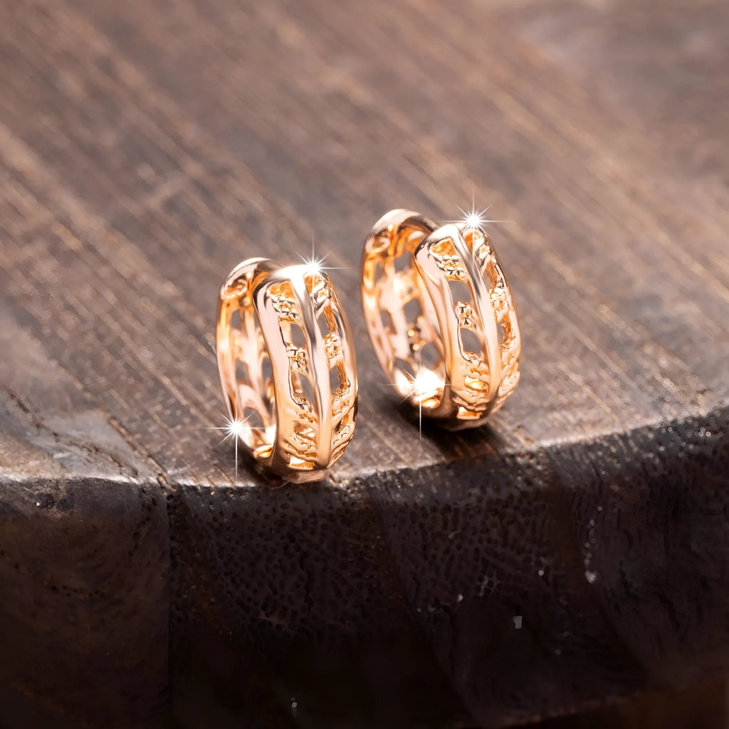 Small rose gold hollowed-out leaf and heart shaped copper earrings
