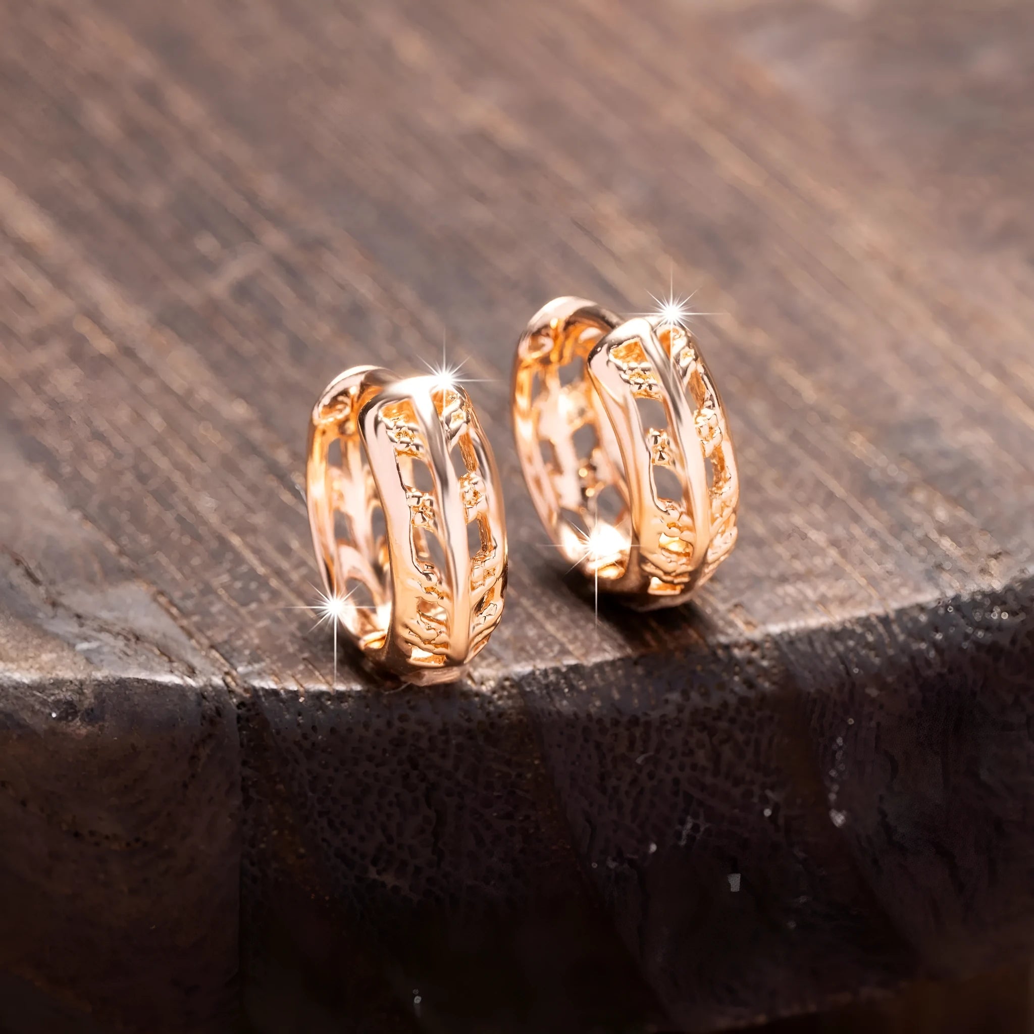 Small rose gold hollowed-out leaf and heart shaped copper earrings
